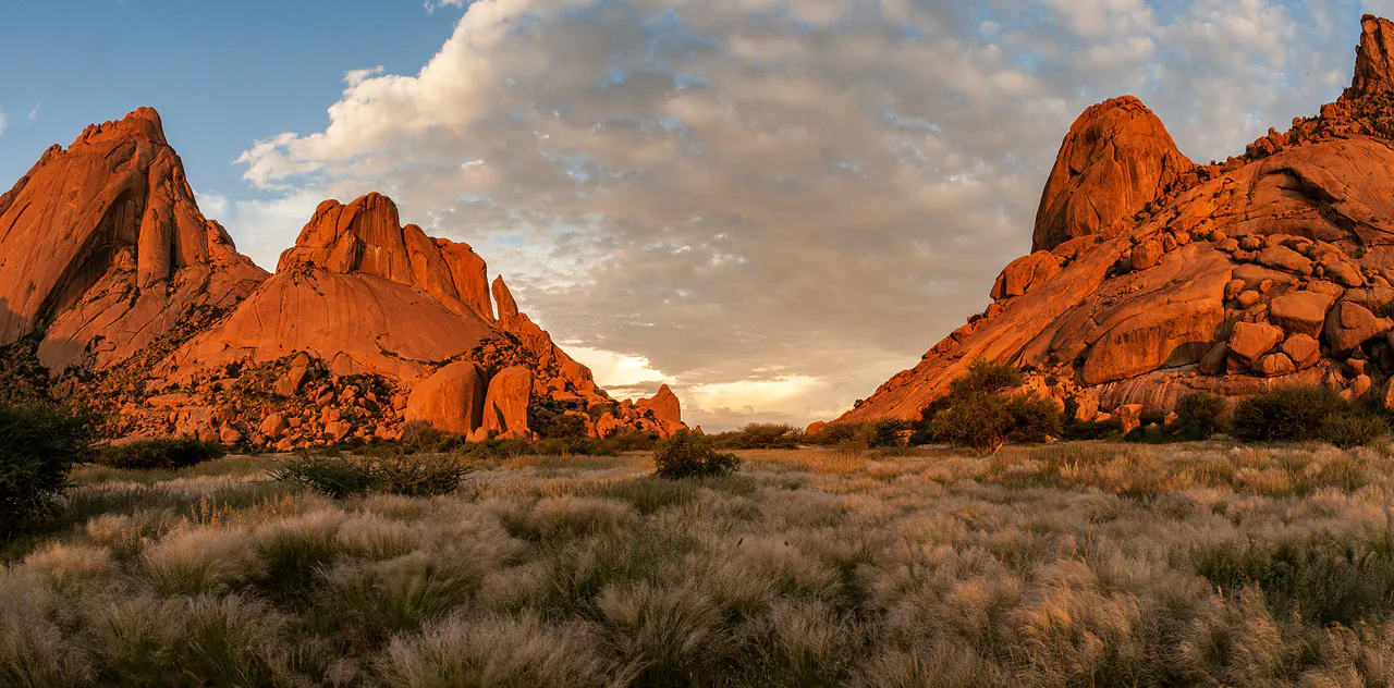 Spitzkoppe granite peaks at sunset, Damaraland Namibia — flown on the Namib circuit
